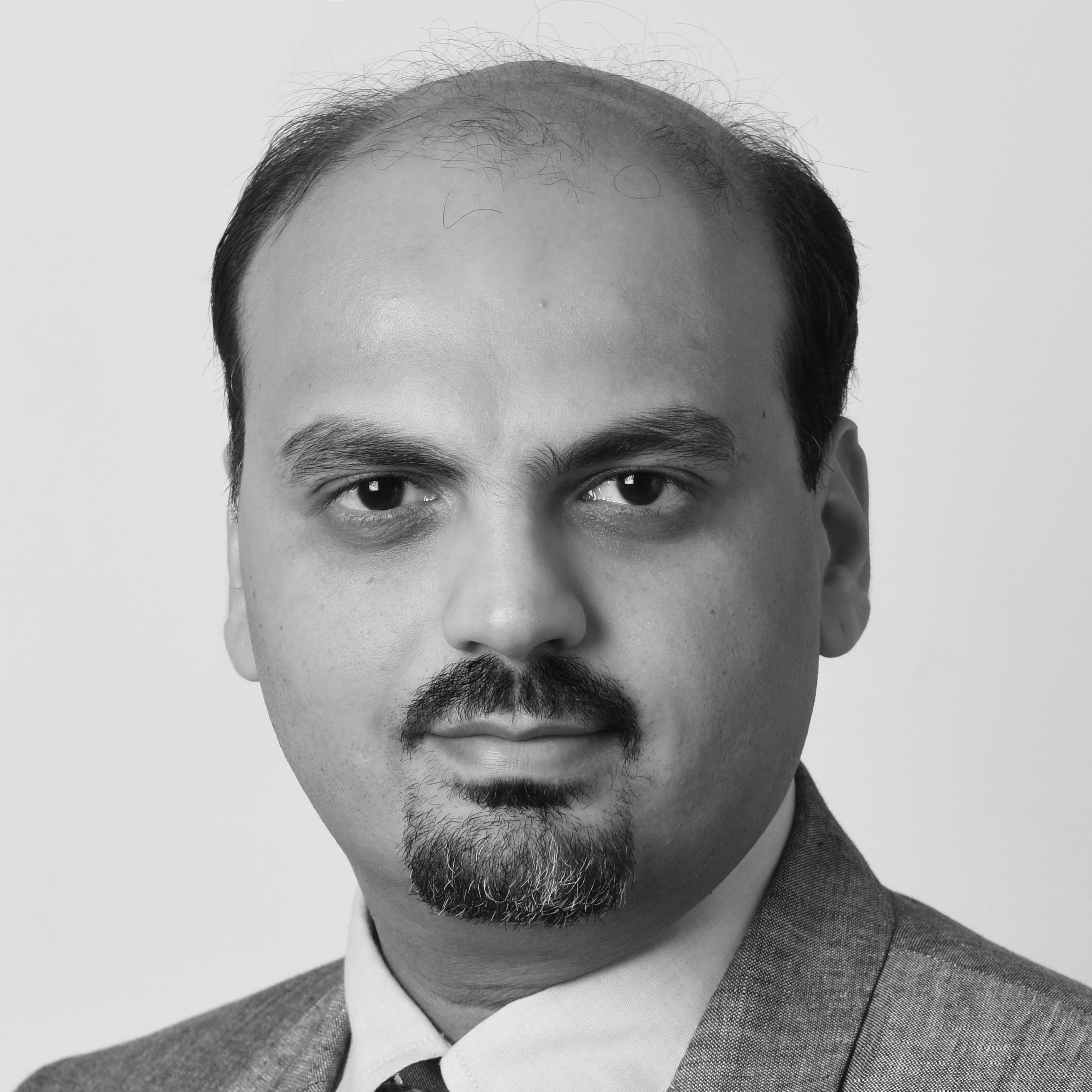 Professor Aalok Khandekar's Headshot